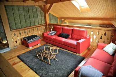 Coin salon dans l'établissement La Ferme du Douanier & Spa 5 étoiles ALL INCLUSIVE