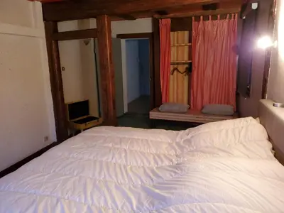 Un ou plusieurs lits dans un hébergement de l'établissement charmant appartement alsacien