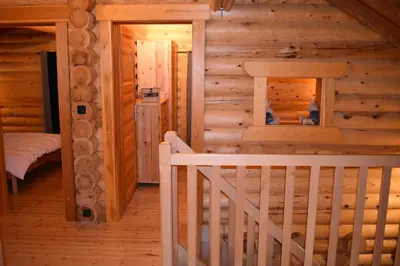 Un ou plusieurs lits dans un hébergement de l'établissement Chalet en rondins - 3 minutes des pistes