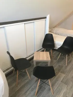 Coin salon dans l'établissement Auberge du Parc