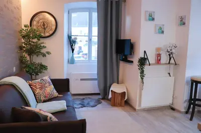Télévision ou salle de divertissement dans l'établissement Le coin 45