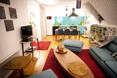 Télévision ou salle de divertissement dans l'établissement Duplex tout équipé, proche centre-ville COLMAR, parking