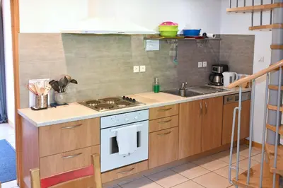 Cuisine ou kitchenette dans l'établissement Pâquerettes - Maison avec Jardin et Parking