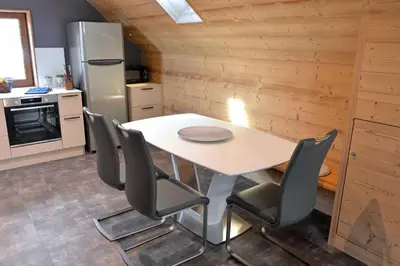 Cuisine ou kitchenette dans l'établissement Le Clos Ô Daims