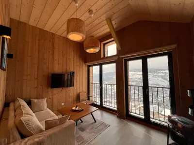 Télévision ou salle de divertissement dans l'établissement Brabant - Vue Panoramique La Bresse/Gerardmer