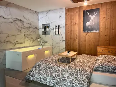 Un ou plusieurs lits dans un hébergement de l'établissement Hohneck - Studio de Montagne La Bresse / Gerardmer