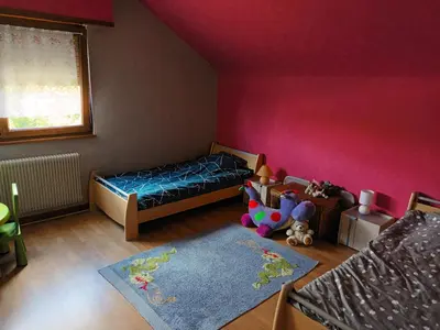 Un ou plusieurs lits dans un hébergement de l'établissement Chez Georges et Colette