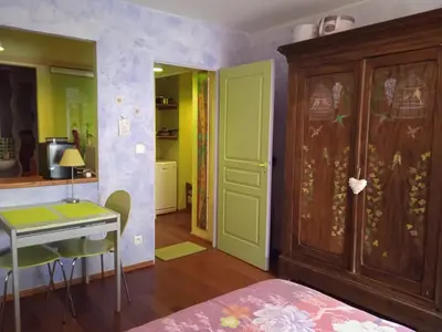 Un ou plusieurs lits dans un hébergement de l'établissement Appartements & Chambres Les Loges du Capucin