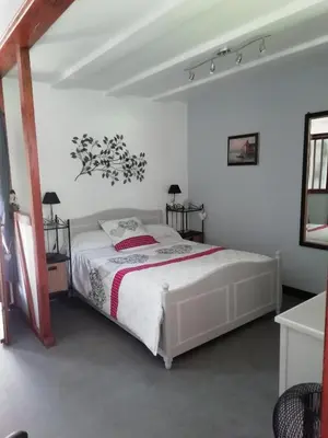 Un ou plusieurs lits dans un hébergement de l'établissement Romantic Studio Vacances