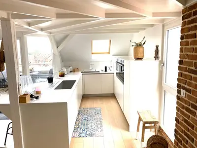 Cuisine ou kitchenette dans l'établissement LA CLE DES TOITS