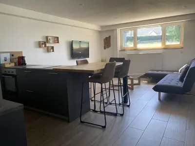 Coin salon dans l'établissement Le Clos des Pommiers Fuji