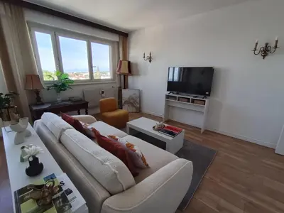 Télévision ou salle de divertissement dans l'établissement Appartement centre ville Mulhouse