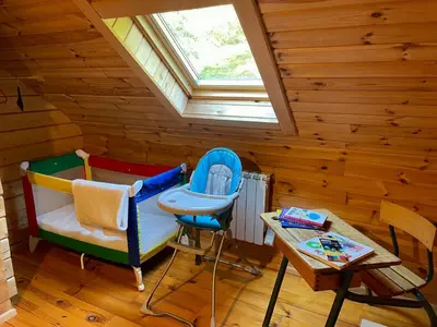 Coin salon dans l'établissement Chalet Des Feignes