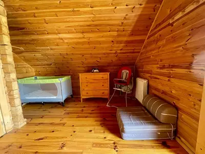 Coin salon dans l'établissement Chalet Des Feignes