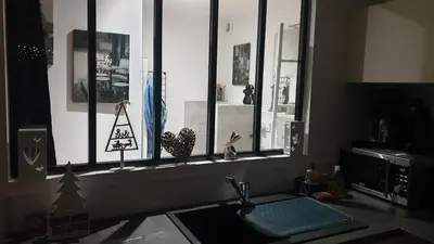 Télévision ou salle de divertissement dans l'établissement AU NID COSY D'ISA A GERARDMER VOSGES - Spas privatifs