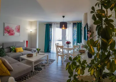 Coin salon dans l'établissement COLMAR SWEET HOME
