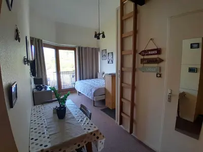 Un ou plusieurs lits dans un hébergement de l'établissement LES DRYADES Vue montagne