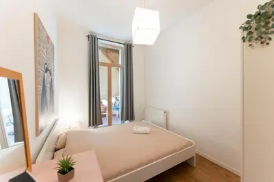 Un ou plusieurs lits dans un hébergement de l'établissement Colmar City Center - Belle Alsace 2 - BookingAlsace