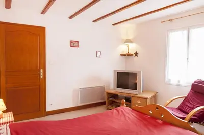 Télévision ou salle de divertissement dans l'établissement gite joseph 2pers dans le vignoble à 8km de Colmar