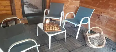 Coin salon dans l'établissement Chalet le Bruleux
