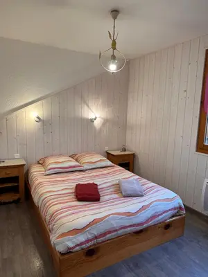 Un ou plusieurs lits dans un hébergement de l'établissement Chalet CHLOE - wifi, BBQ, parking