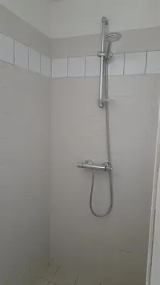 Salle de bains dans l'établissement L'AMANDAURE