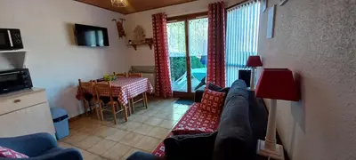 Télévision ou salle de divertissement dans l'établissement Hameau des chaumes vue panoramique