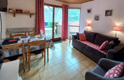 Coin salon dans l'établissement Hameau des chaumes vue panoramique