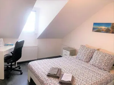 Un ou plusieurs lits dans un hébergement de l'établissement MyHome Basel 3B44