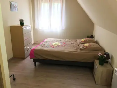 Un ou plusieurs lits dans un hébergement de l'établissement Le Chalet La Cigogne et Le Chamois