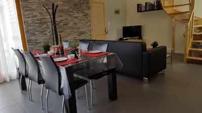 Télévision ou salle de divertissement dans l'établissement Le Chalet La Cigogne et Le Chamois