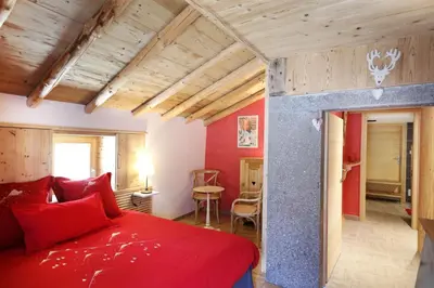 Un ou plusieurs lits dans un hébergement de l'établissement Les chalots de Gérardmer, Chambre d'Hôtes