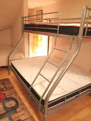 Un ou plusieurs lits dans un hébergement de l'établissement Studio Bar sur Mulhouse Sud