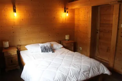 Un ou plusieurs lits dans un hébergement de l'établissement Chalet de la Rigue
