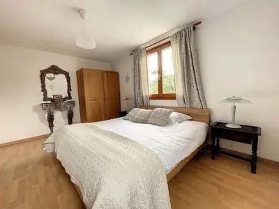 Un ou plusieurs lits dans un hébergement de l'établissement Appartement 2 chambres au cœur du vignoble avec terrasse