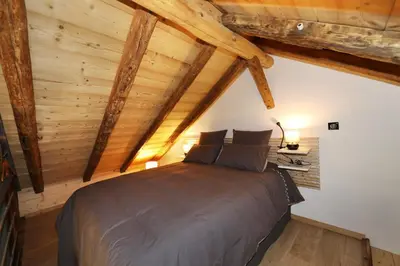 Un ou plusieurs lits dans un hébergement de l'établissement Les Chalots de Gérardmer, Gîte 1, Classé 3