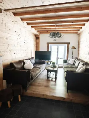 Coin salon dans l'établissement Gîte nature & calme au pied des sentiers, 10 km Gérardmer - 8 à 11 pers