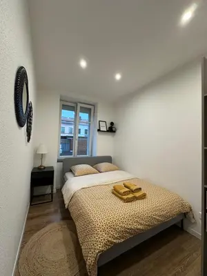 Un ou plusieurs lits dans un hébergement de l'établissement Le 2 - Très Beau T3 1er étage tout confort, neuf, Mulhouse centre - stationnement gratuit