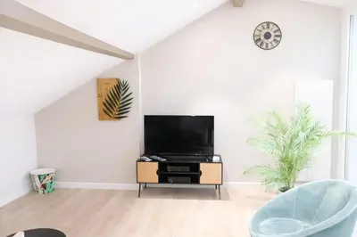 Télévision ou salle de divertissement dans l'établissement Modern Living