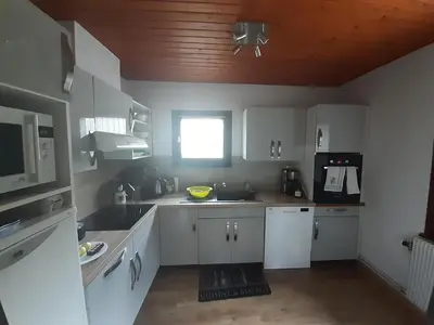 Cuisine ou kitchenette dans l'établissement Chalet Les Chardons
