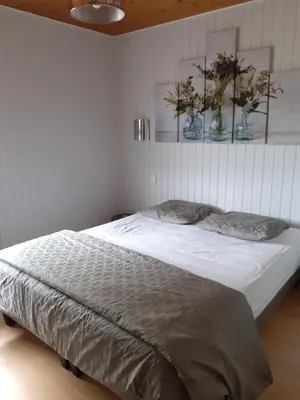 Un ou plusieurs lits dans un hébergement de l'établissement Chalet Les Chardons