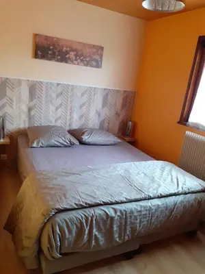 Un ou plusieurs lits dans un hébergement de l'établissement Chalet Les Chardons
