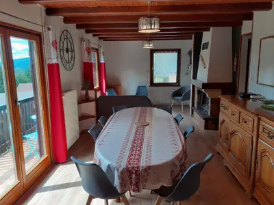 Coin salon dans l'établissement Chalet Les Chardons