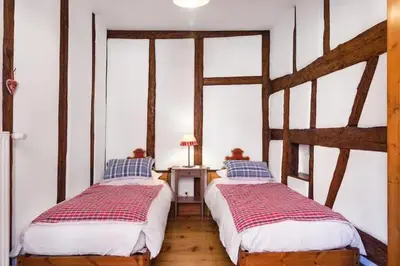 Un ou plusieurs lits dans un hébergement de l'établissement Maison cosy à Kientzheim + Parking