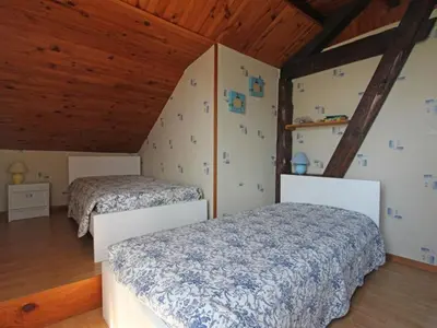Un ou plusieurs lits dans un hébergement de l'établissement Gîte nature, 15 km de Gérardmer, randonnée, ski, jardin, terrasse, BBQ, équipements bébé inclus - FR-1-589-64