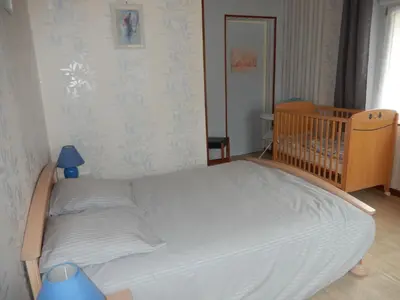 Un ou plusieurs lits dans un hébergement de l'établissement Gîte en pleine nature, proche de La Bresse avec activités familiales, terrasse et poêle à bois - FR-1-589-70