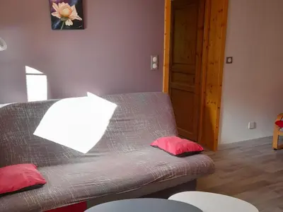 Coin salon dans l'établissement Gîte familial à Cornimont avec Wifi et parking - FR-1-589-84