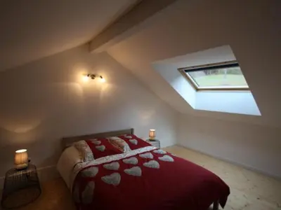 Un ou plusieurs lits dans un hébergement de l'établissement Charmant chalet 3 chambres avec terrasse proche Alsace - FR-1-589-112