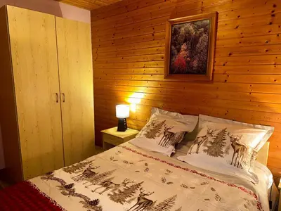 Un ou plusieurs lits dans un hébergement de l'établissement Chalet confortable avec cheminée proche de La Bresse-Hohneck, idéal pour famille et amis. - FR-1-589-123