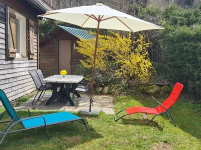Jardin de l'établissement Chalet confortable avec cheminée proche de La Bresse-Hohneck, idéal pour famille et amis. - FR-1-589-123